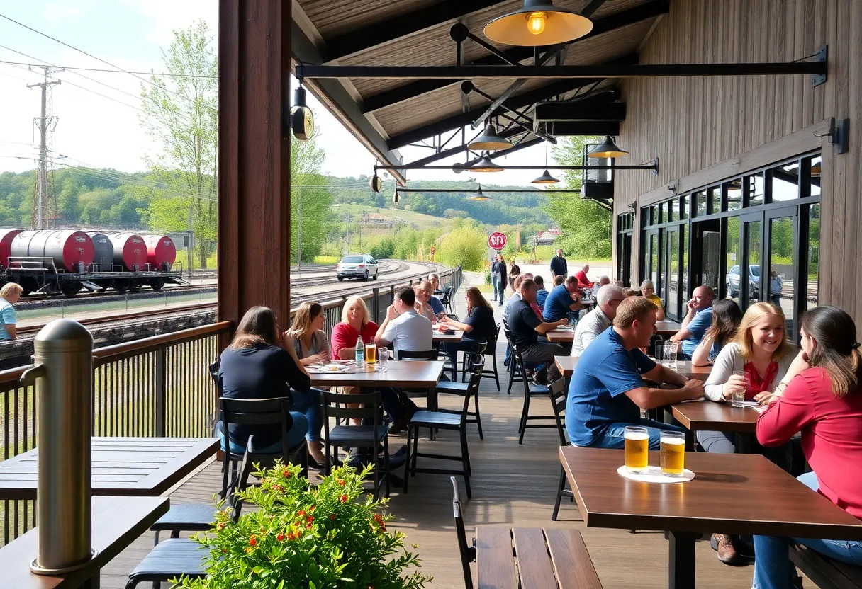 Patrons enjoying food and drinks at Ciclops Cyderi & Brewery's new location along the Mary Black Rail Trail.