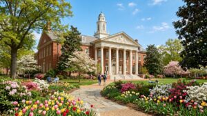 Historic university campus with columns and spring flowers in bloom