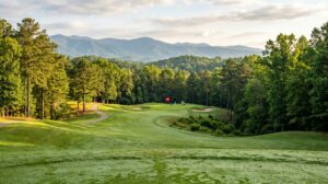 Rolling green golf course fairway with mountain views in the Upstate