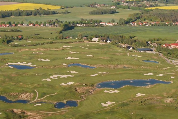 Golf course fairway with trees
