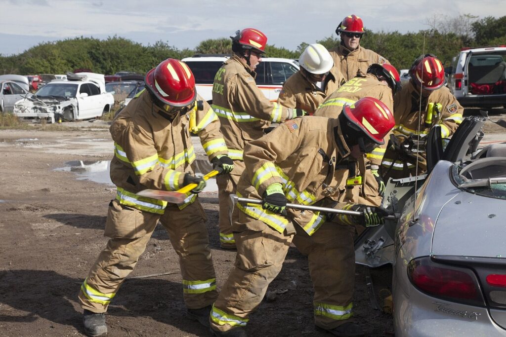 Firefighters training with a hose