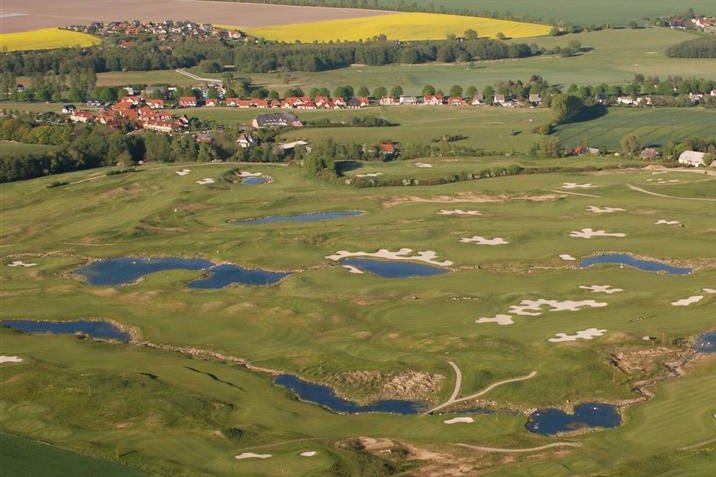 Golf course fairway with trees